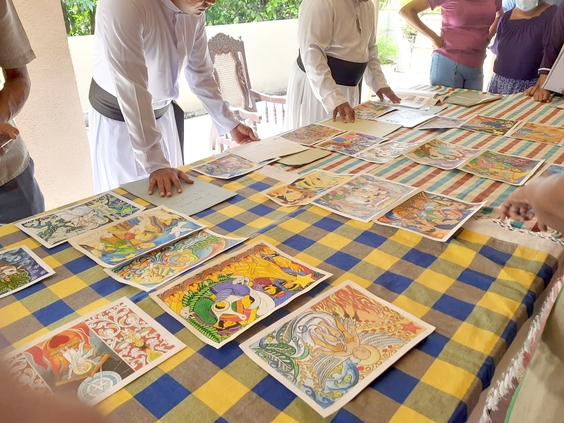 Selecting winner of Christmas postage stamp art competition 2022